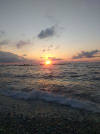 Scenic view of sea against sky during sunset