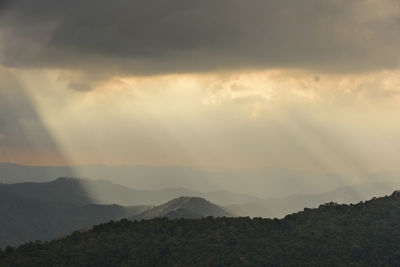 Scenic view of mountains against sky during sunset