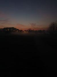 Scenic view of silhouette trees against sky during sunset