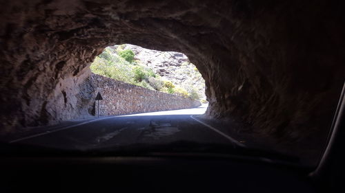 Road seen through car windshield