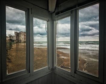Sea seen through glass window