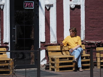 Woman sitting on chair