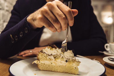 Man eating cake