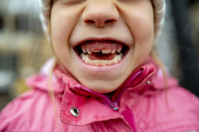 Happy girl showing gap toothed