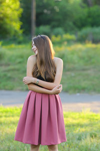 Woman standing on field