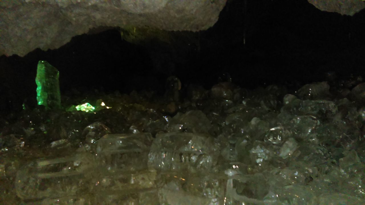 CLOSE-UP OF ILLUMINATED GLASS WINDOW