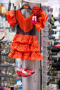 Rear view of woman standing in store