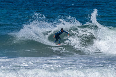 Man surfing in sea