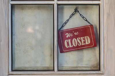 Close-up of text on brick wall
