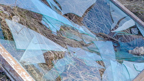 High angle view of broken glass window