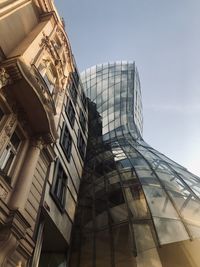 Low angle view of modern building against sky