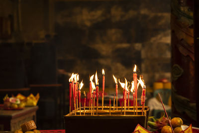 Burning candles in temple