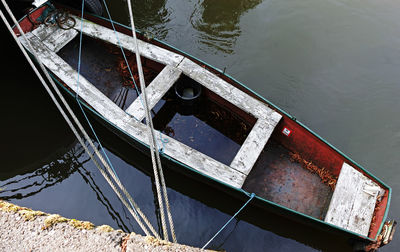 High angle view of boat moored in lake