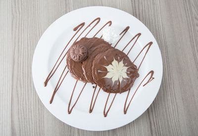 High angle view of cake in plate on table