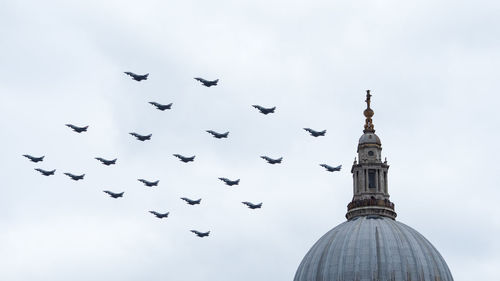 22 typhoon aircraft in 100 formation on the raf 100 years flypast above st paul's cathedral