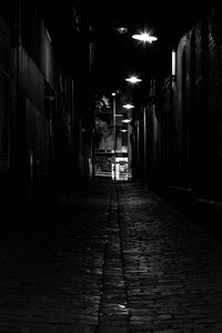 Surface level of narrow street along buildings