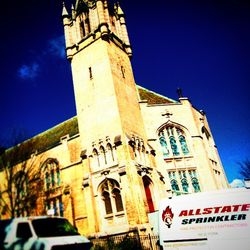 Low angle view of church against blue sky