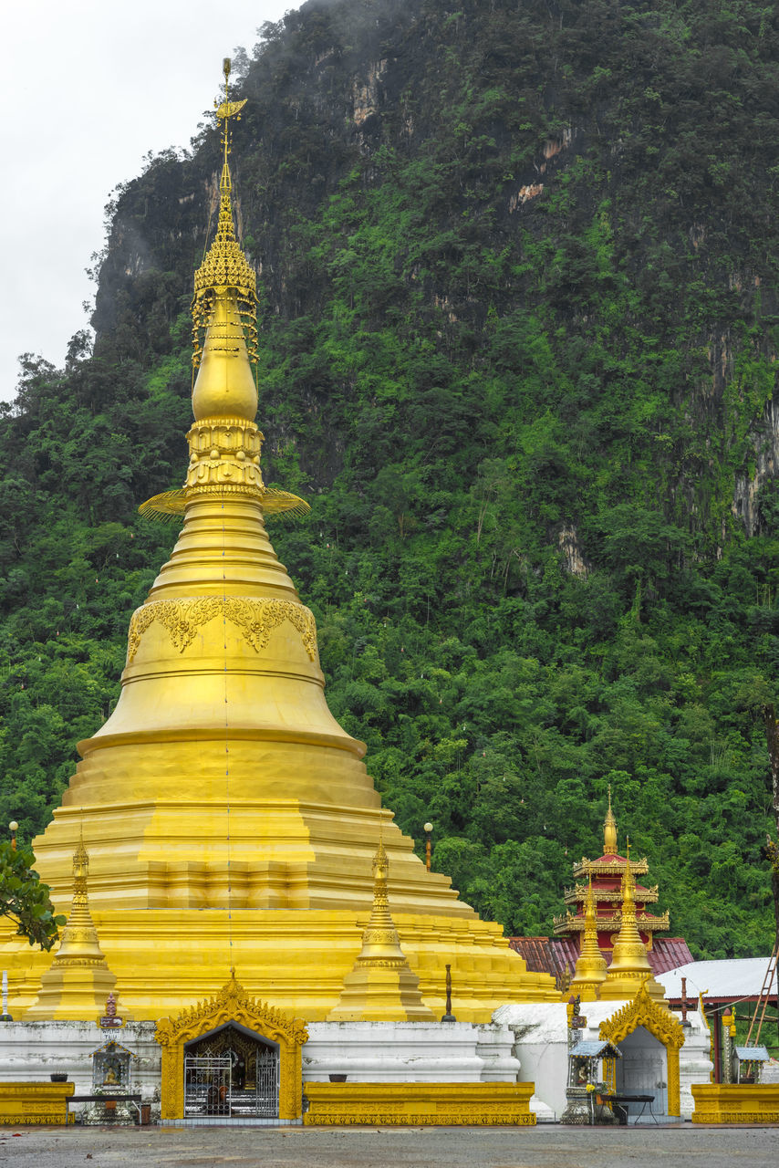 VIEW OF PAGODA AGAINST TREES AND TEMPLE