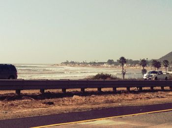 Scenic view of calm sea against clear sky