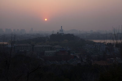 View of cityscape at sunset