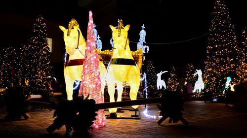 Group of people dancing at night