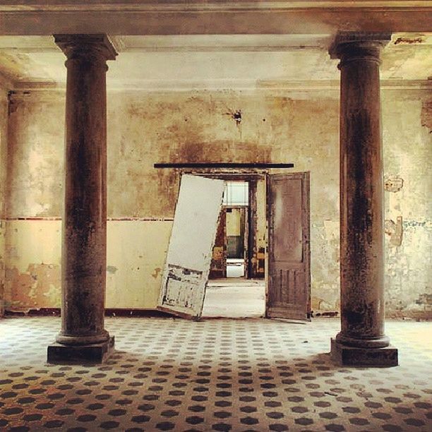 architecture, built structure, architectural column, column, colonnade, history, building exterior, pillar, sunlight, indoors, flooring, old, day, support, shadow, corridor, no people, in a row, entrance, door