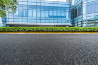 Surface level of road against buildings in city