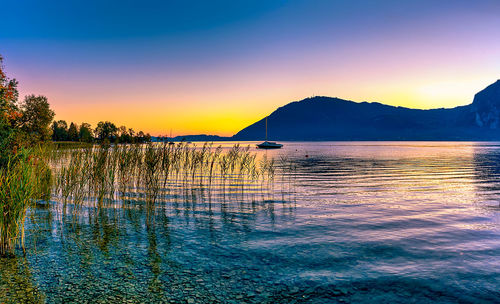 Scenic view of sea against sky during sunset