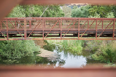 Surface level of bridge over calm lake