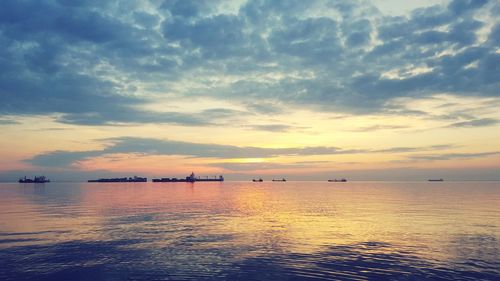 Scenic view of sea against sky during sunset