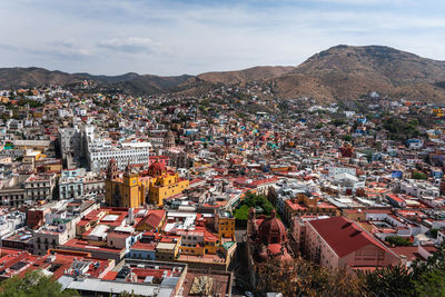 High angle shot of townscape against sky