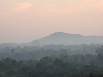 Scenic view of mountains against sky during sunset