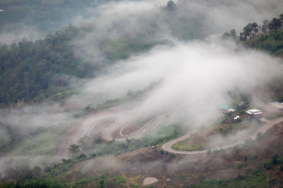 High angle view of fog on mountain