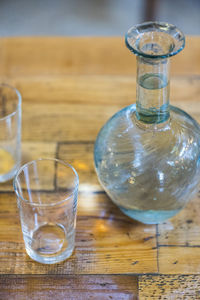 Close-up of water in glass container on table