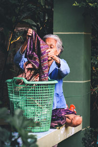 Full length of couple standing in basket