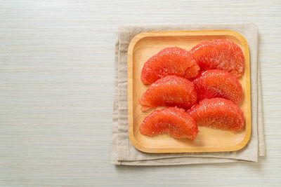 Directly above shot of strawberries in plate on table