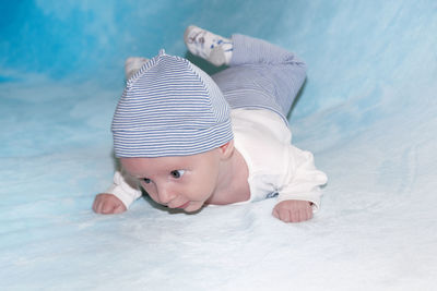 High angle view of cute baby lying down