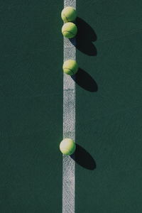 Close-up of yellow ball on table