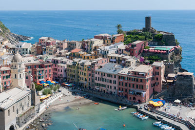 High angle view of residential buildings by sea at vernazza