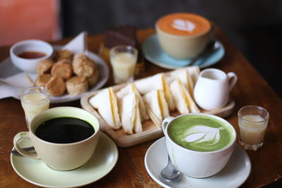 Close-up of tea and coffee on table