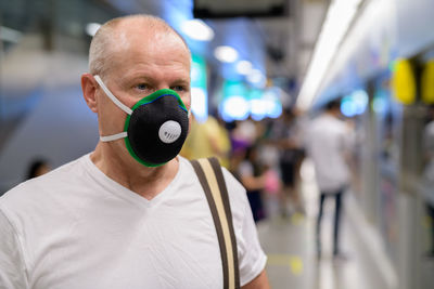 Portrait of man wearing mask