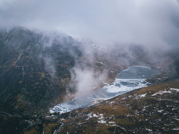 Scenic view of mountains against sky during winter