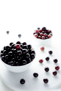 High angle view of berries in bowl on table