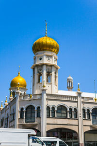 Low angle view of cathedral against blue sky