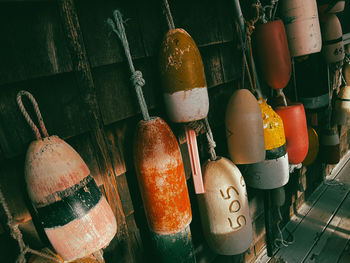 Close-up of clothes hanging on wood