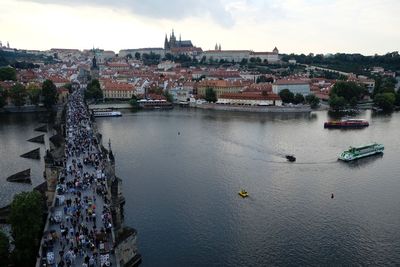 High angle view of charles bridge over vltava river in city