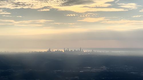 High angle view of cityscape against sky during sunset