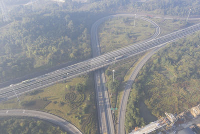 Aerial view of highway seen through window
