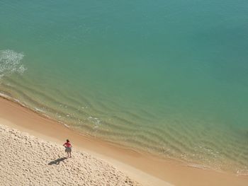 High angle view of woman on beach