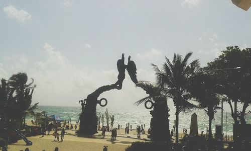 Silhouette of statue against sky